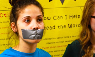 Girl with Mouth Taped Shut