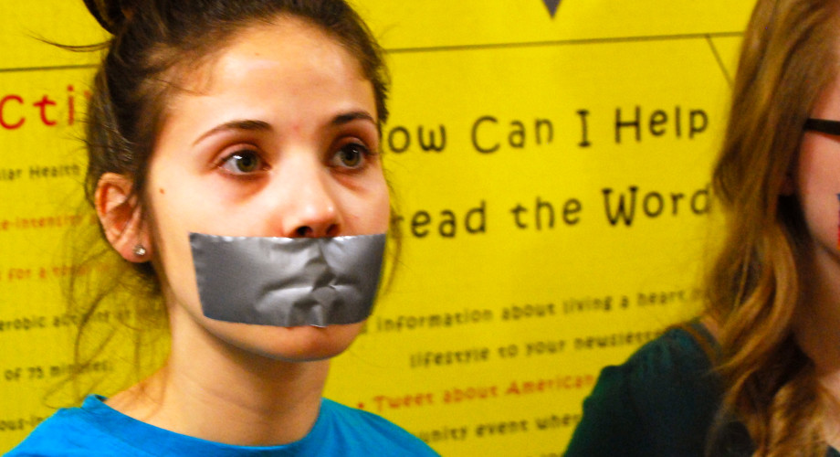 Girl with Mouth Taped Shut